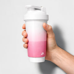 Stockka white and pink ombre BPA-free plastic shaker bottle with patent lid, ideal for protein shakes.