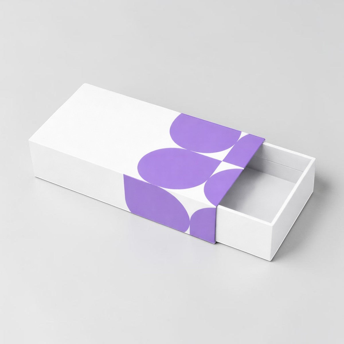 Stockka white rigid board gift box with a purple abstract petal design, featuring a pull-out drawer for jewelry or small accessories.