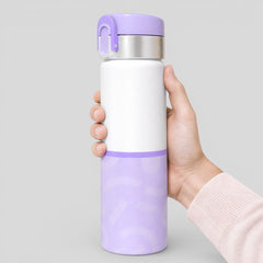 Stockka white and purple stainless steel thermal bottle with flip-top lid and decorative pattern, held by a hand.