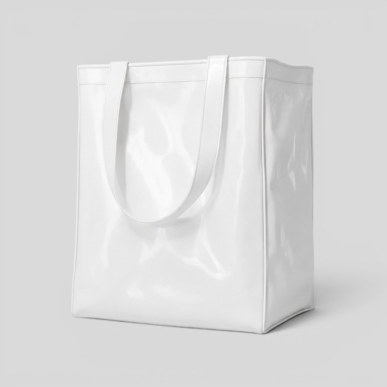 Stockka white PVC tote bag with reinforced handles, ideal for shopping and events. Durable and reusable.