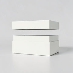 Stockka white rigid box with removable lid, ideal for luxury products, jewelry, or gifts. Cardboard material.