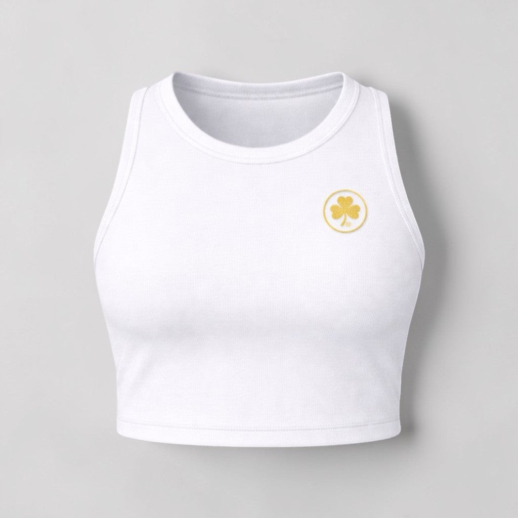 Stockka white cotton-spandex blend crop top with a gold shamrock logo on the chest. Sleeveless, fitted design.