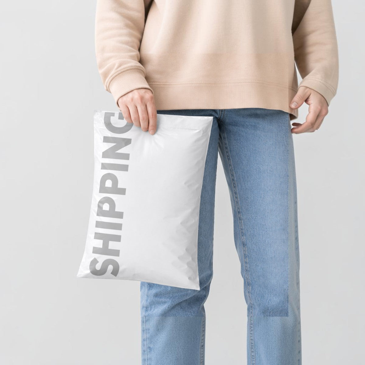 Stockka white vertical shipping mailer bag with self-adhesive strip, made of durable LDPE plastic for secure online order packaging.