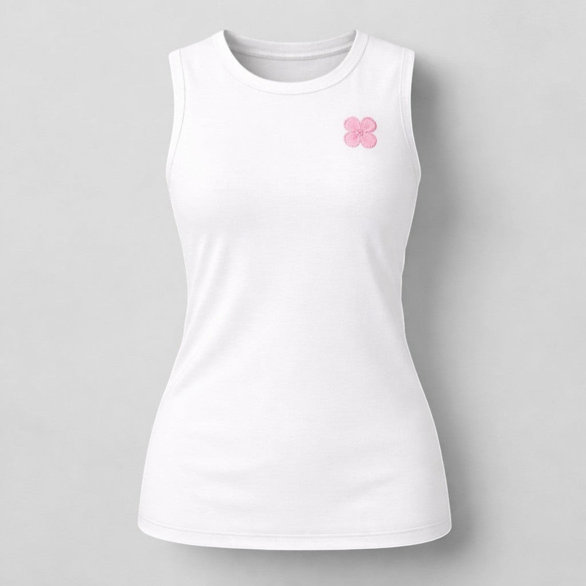 Stockka white sleeveless athletic tank top with pink embroidered flower detail. Made from breathable polyester blend.