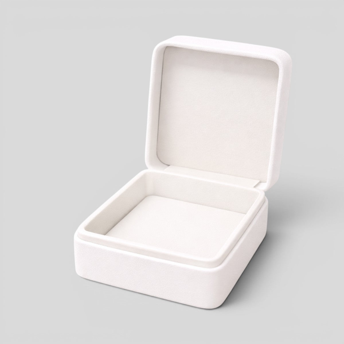 Stockka white square jewelry box with hinged lid and soft interior lining, perfect for rings or necklaces.