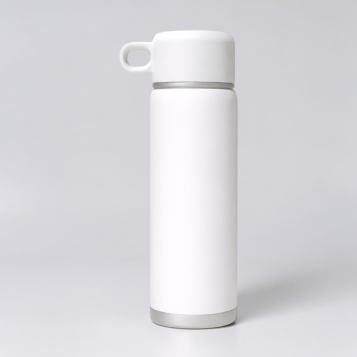 Stockka white stainless steel thermal bottle with double insulation and a round carrying lid, ideal for travel and daily use.