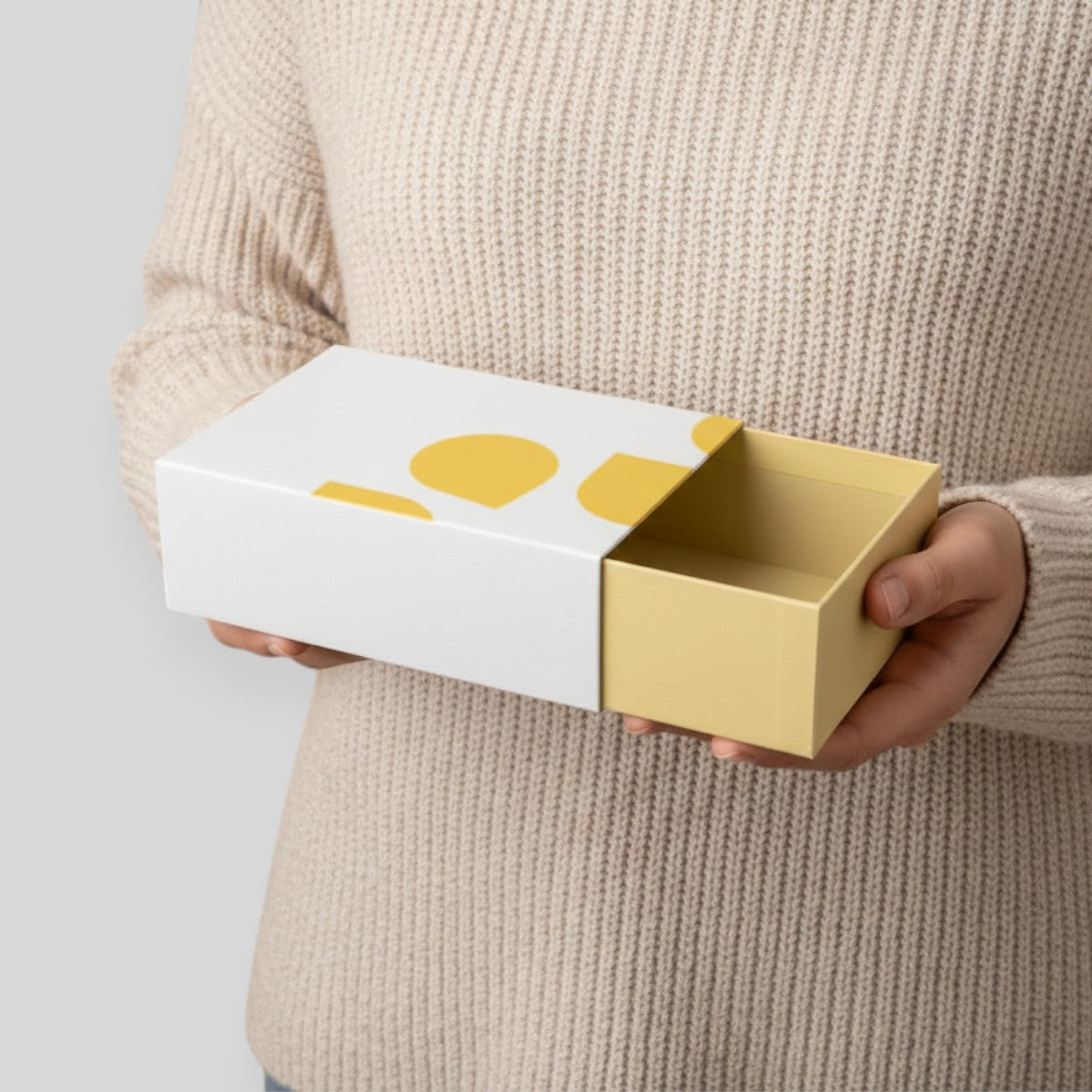 Stockka white drawer gift box with yellow abstract shapes, suitable for jewelry or luxury items.