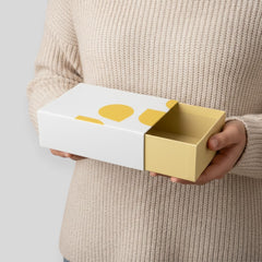 Stockka white drawer gift box with yellow abstract shapes, suitable for jewelry or luxury items.