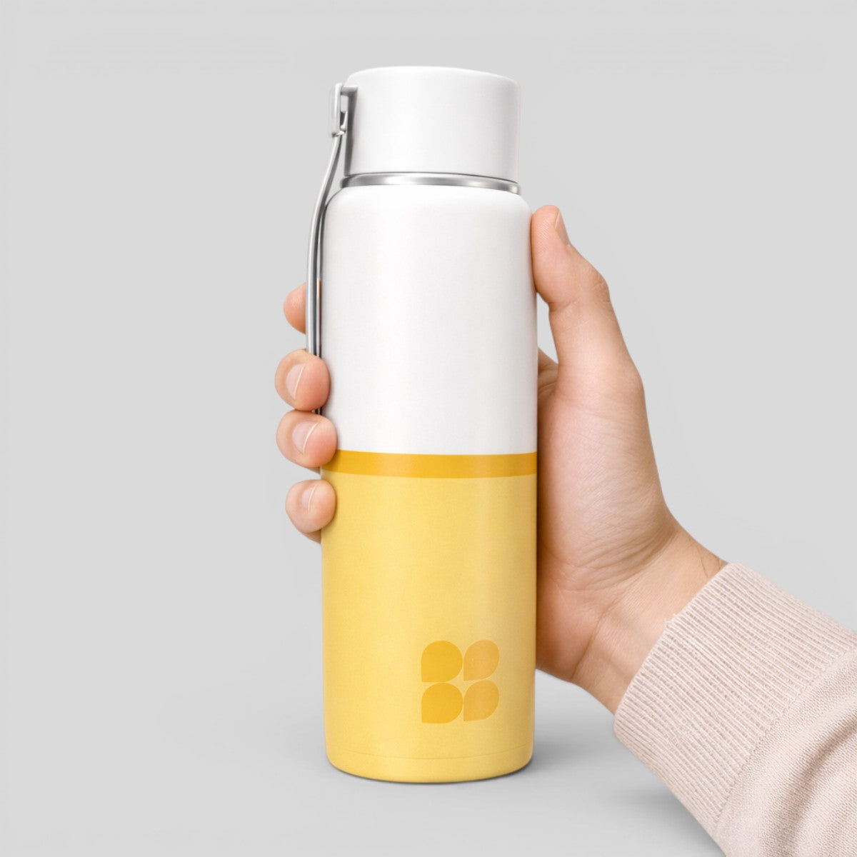 Stockka white and yellow BPA-free plastic water bottle with screw-top lid and hanging handle.