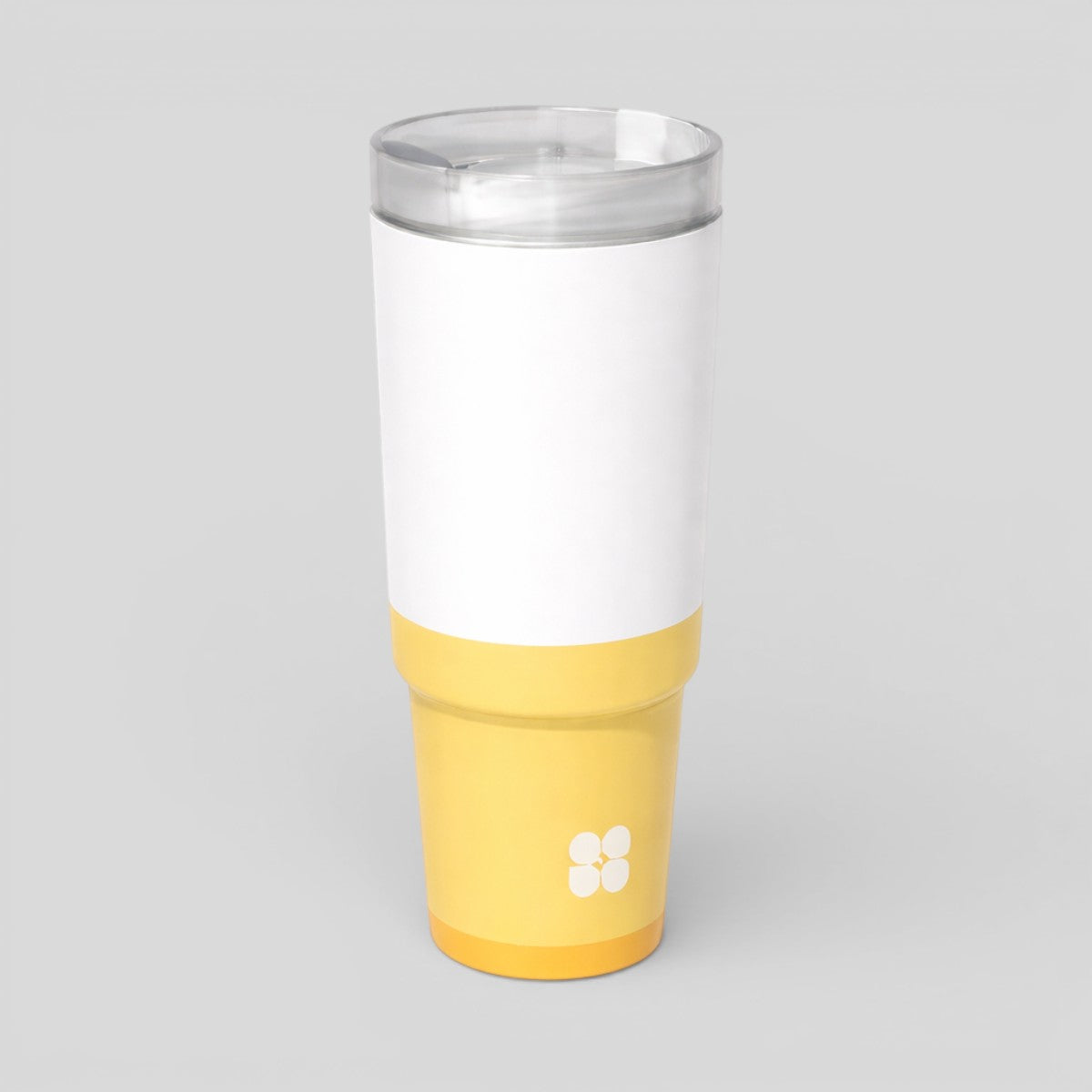 Stockka white and yellow double-walled stainless steel tumbler with clear lid and elevated base.