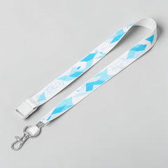 Stockka wide white nylon lanyard with blue geometric pattern, side buckle, and two metal clips.