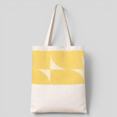 Stockka yellow and cream geometric print cotton canvas tote bag with cream straps.