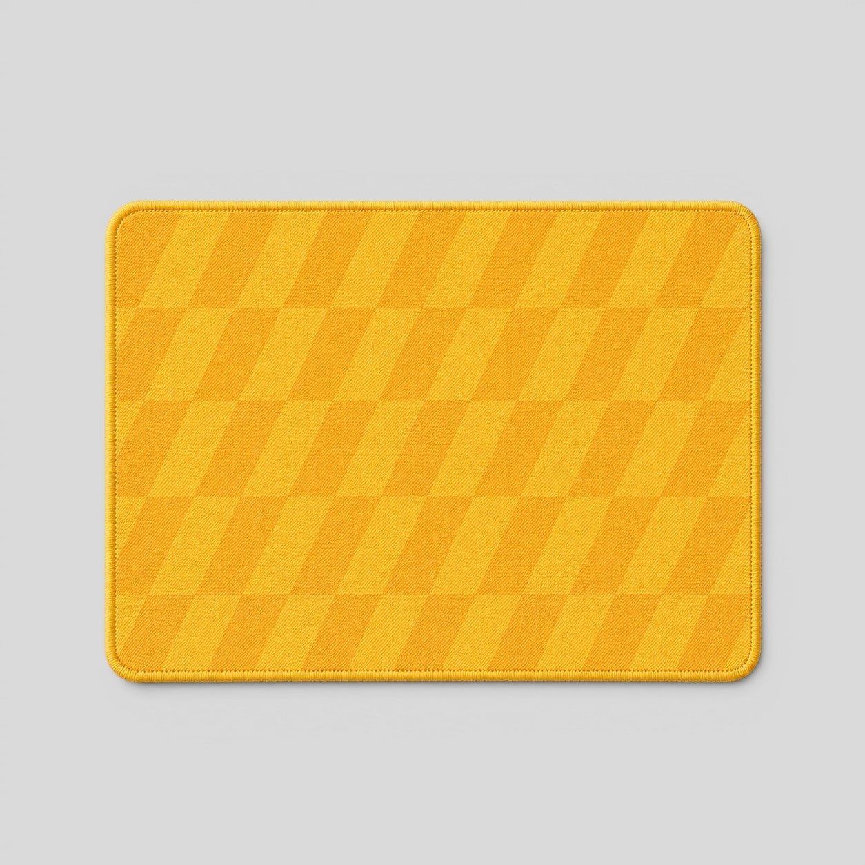 Stockka premium rectangular mousepad with a yellow and orange geometric pattern. Ideal for office and business branding.