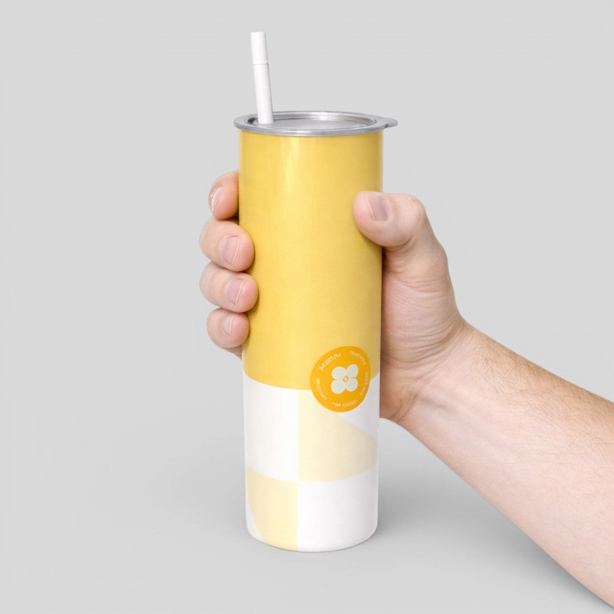 Stockka tall yellow and white stainless steel tumbler with clear lid and reusable straw, perfect for smoothies or iced coffee.