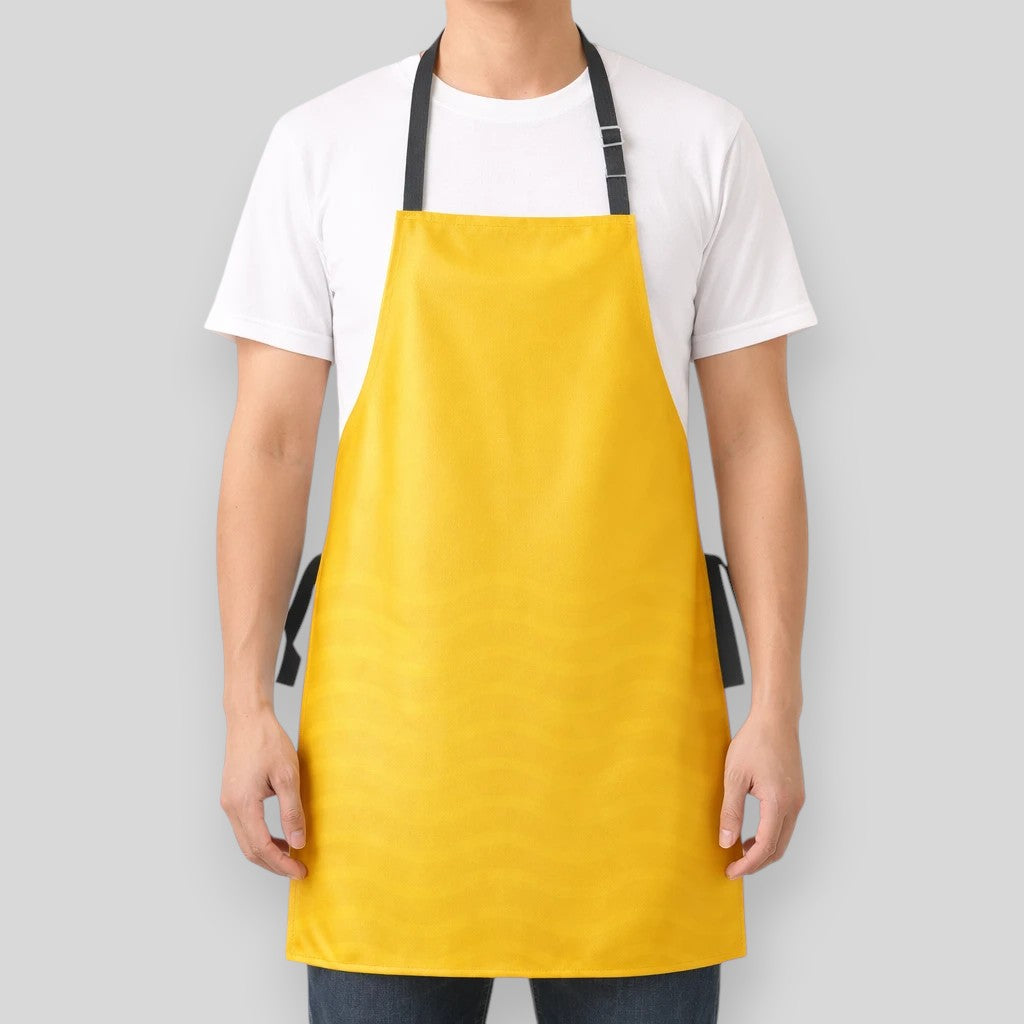 Stockka waterproof yellow polyester apron with adjustable neck strap and long waist ties, ideal for kitchens and cleaning.