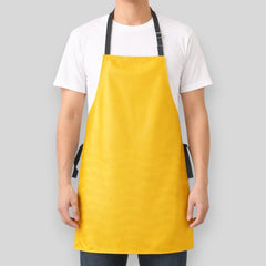 Stockka waterproof yellow polyester apron with adjustable neck strap and long waist ties, ideal for kitchens and cleaning.